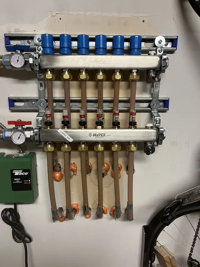 Plumber performing Water Heater Repair at a residential property in Bunk Foss